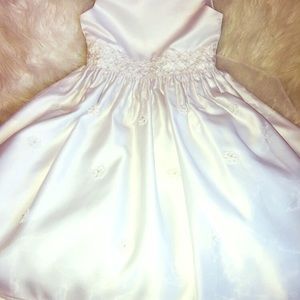 Child’s white formal dress.